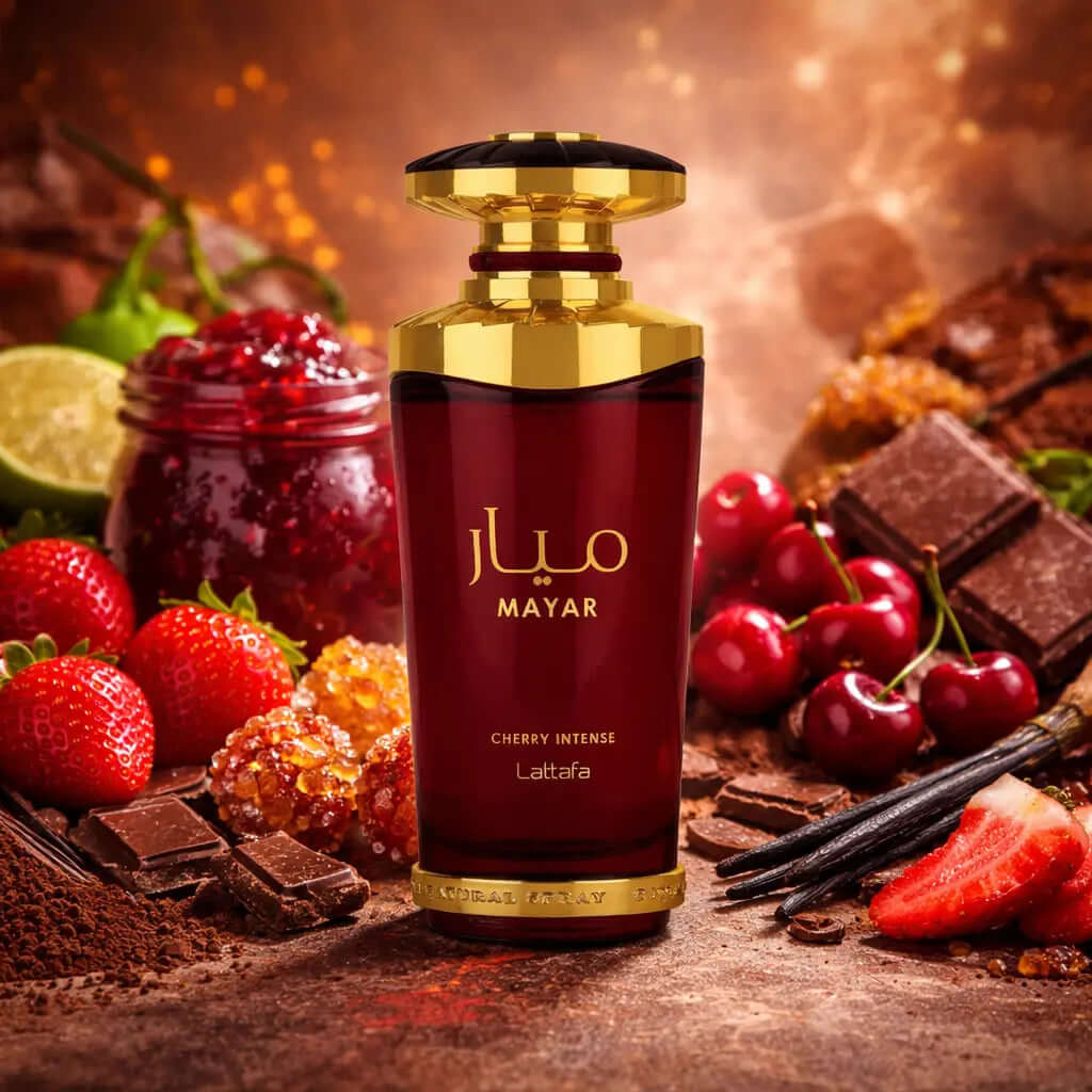 LATTAFA Mayar Cherry Intense perfume bottle surrounded by fruits and chocolate on a warm background